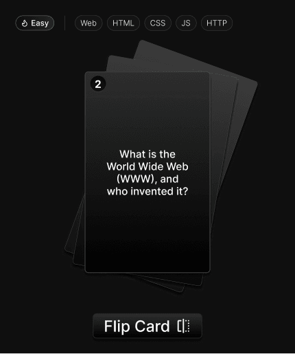 Stack of black cards with one facing up, reading "What is the World Wide Web (WWW), and who invented it?" Tags above say Easy, Web, HTML, CSS, JS, HTTP.